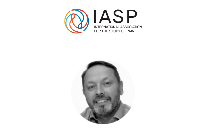 Photo du membre Éric Troncy sous le logo de l'IASP